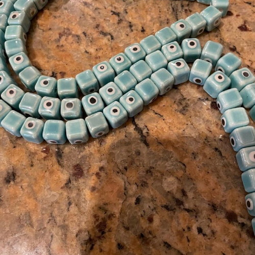 Enamelled ceramic cube-shaped evil eye beads, new, turquoise