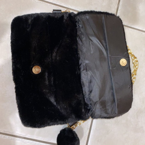 Evening shoulder bag like new, black with gold details