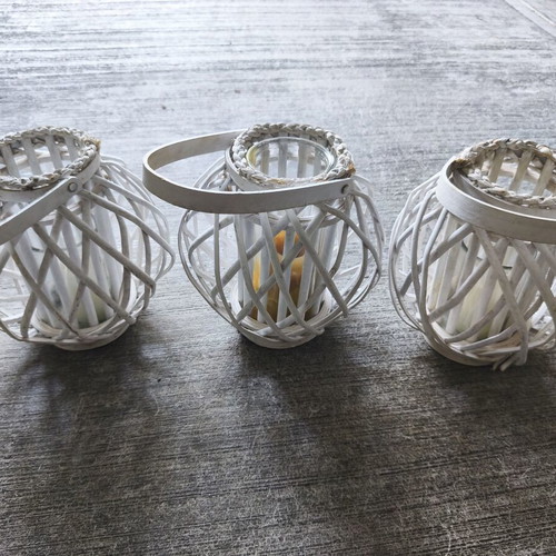 Set of 6 white rattan lanterns with glass candle holders used