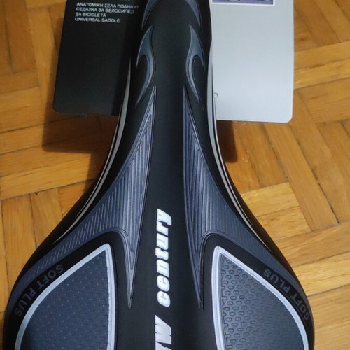 Bicycle saddle new, soft with rear reflector and adjustable front