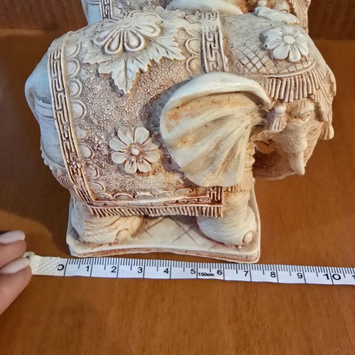 Pair of decorative elephants used with detailed embossed design