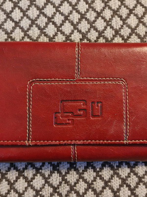Red wallet used with multiple compartments