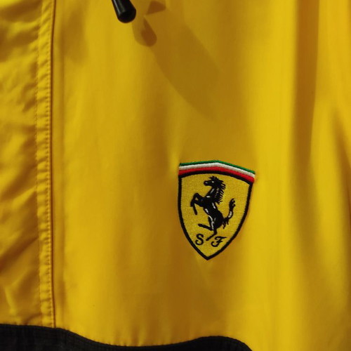 Ferrari Original windbreaker used, size XL, yellow with baby carrier
