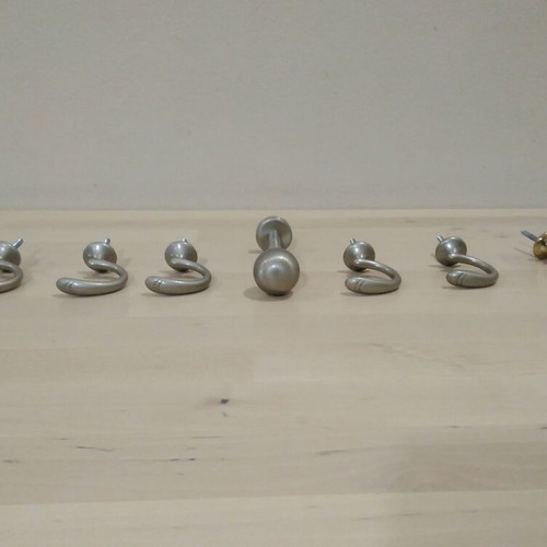 Curtain support bases set used, 8 bronze pieces, silver and gold
