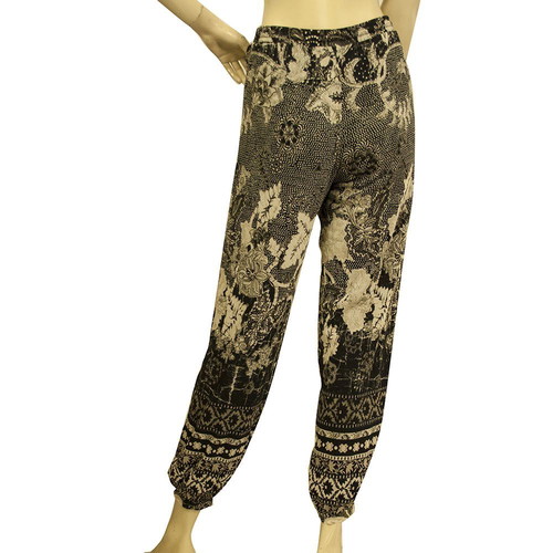 Fuzzi floral black and beige trousers used, size S