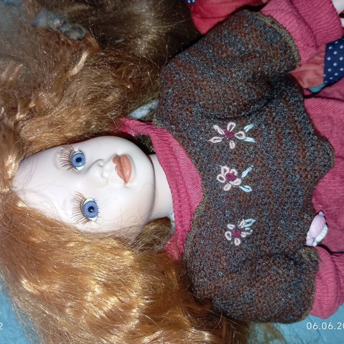 Porcelain dolls like new, 45 cm height
