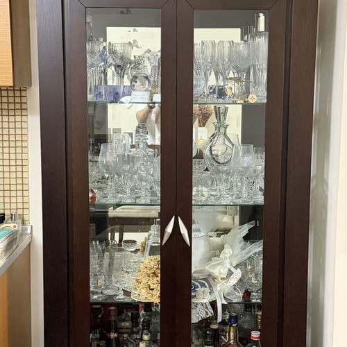 Living room display cabinet with glass doors like new, dark wood