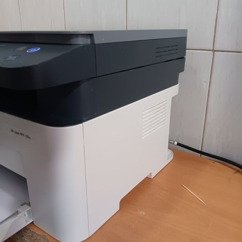 HP LaserJet Pro MFP 135A multifunction printer like new with toner 2K