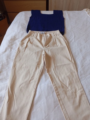 Set with dark blue handmade knitted blouse and beige pants like new