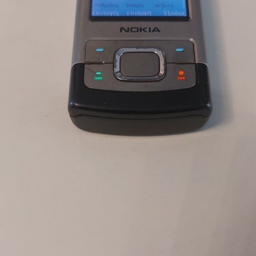 Nokia 6500 Slide phone like new with original charger, silver/black