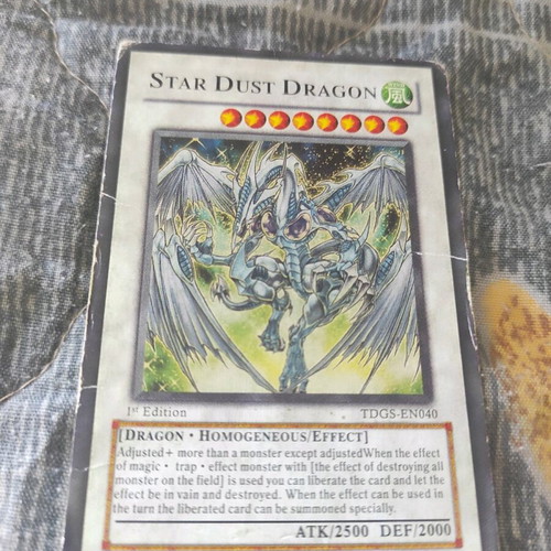 Star Dust Dragon Yu Gi Oh collectible card missing typical mark