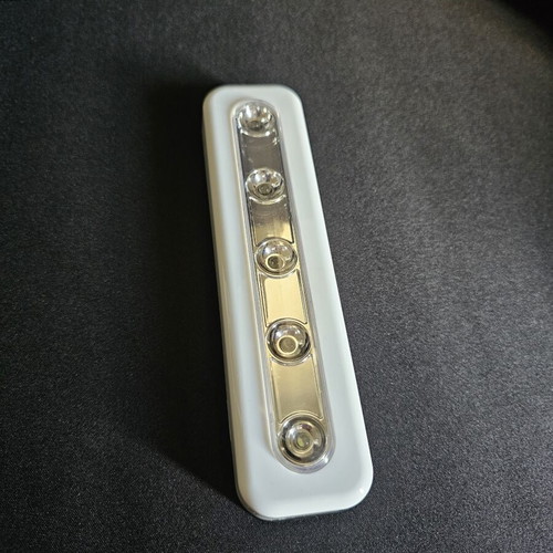 Led light new, press to turn on, with adhesive strips