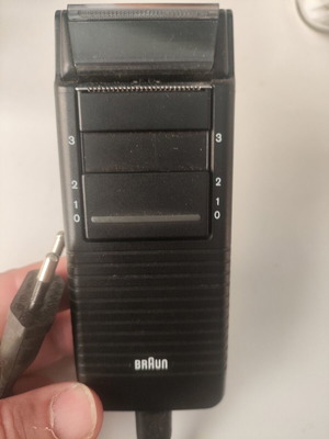 Braun shaver used with leather case
