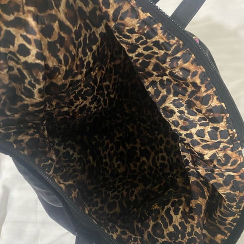 Victoria's Secret shoulder bag used with gold details and leopard inside