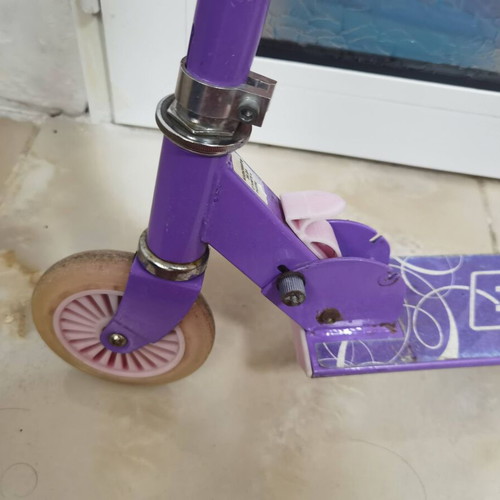 Children's scooter used, purple with 3 height levels
