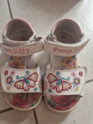White sandals with designs used size 21