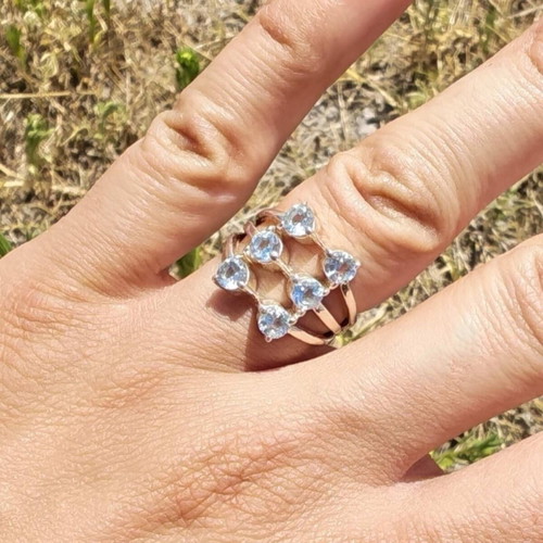 Silver ring with blue topaz