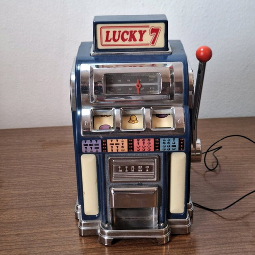 Marksman Las Vegas Lucky 7 AM/FM radio used, one armed bandit slot machine