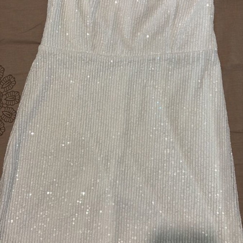 Strapless mini dress used, white with feathers