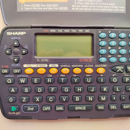Sharp EL-6790 electronic organizer used, with external marks