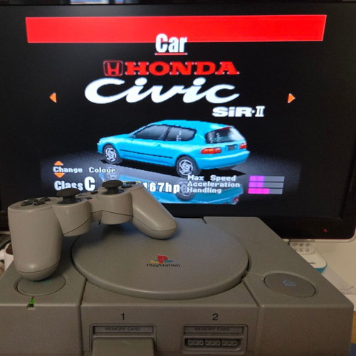 Sony PlayStation SCPH-7502 PS1 console used with Dualshock controller