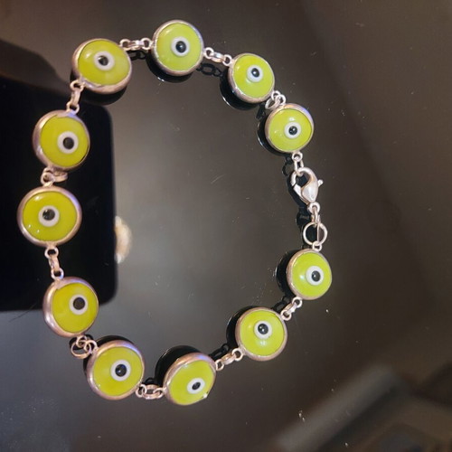 Silver bracelet like new, green accents
