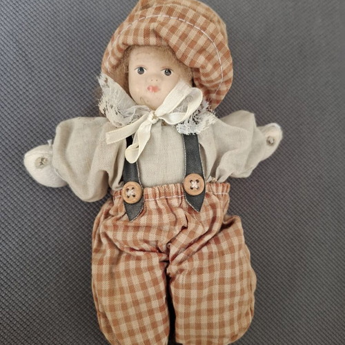 Vintage porcelain doll used, decorative collectible
