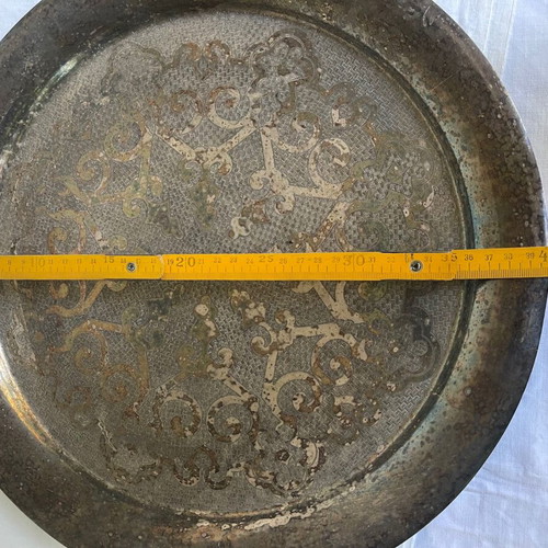 Large serving tray used with Arabic design and patina