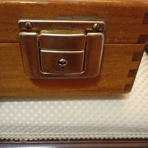 Vintage wooden suitcase made of genuine teak wood, used