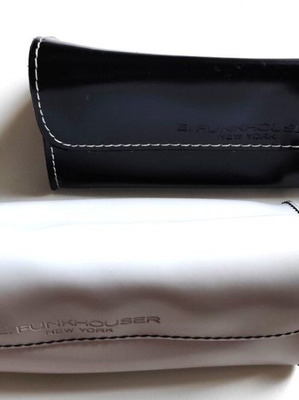 Leather glasses case like new, black and white