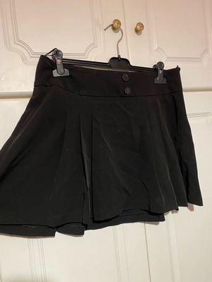 Black satin skirt with buttons, like new, size medium-large