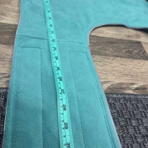 Waterproof dog jacket like new with fleece lining in petrol color