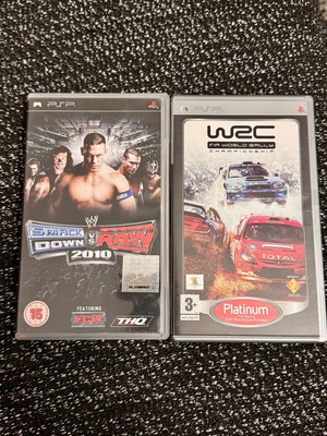 PSP games like new with papers Smack Brown vs Raw 2010 and WRC World Rally