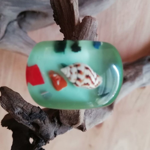 Blown glass ring with shell in transparent green color new