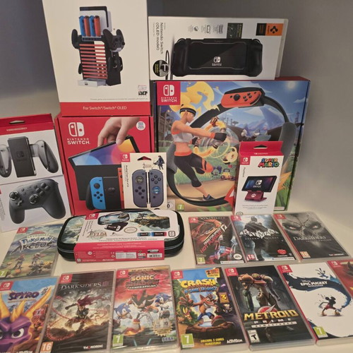 Nintendo Switch OLED like new with complete set and gifts