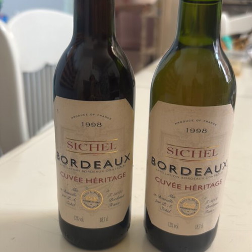 Wine collectible small red and white sealed bottles