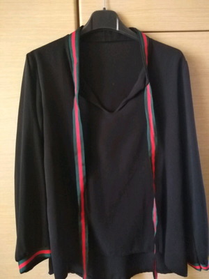 Black blouse with unique design, like new