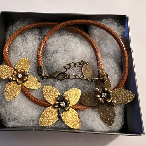 Brown leather necklace with metal floral details and rhinestones like new