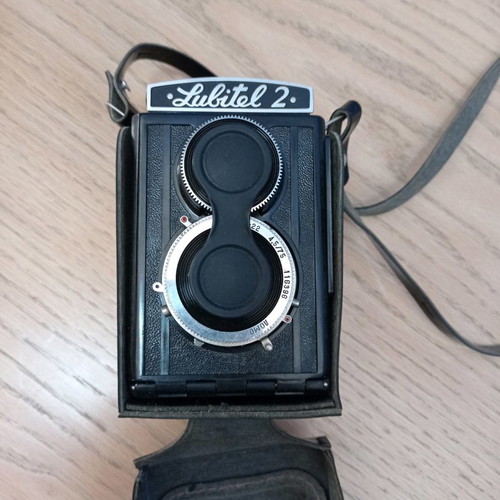 Lubitel 2 camera used with black leather case
