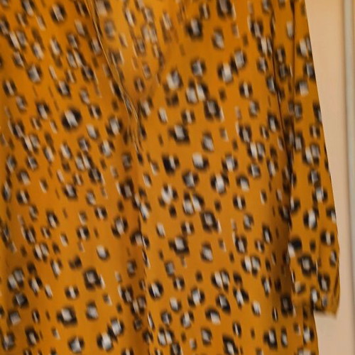 Zara shirt size M like new with ruffle back black and gold