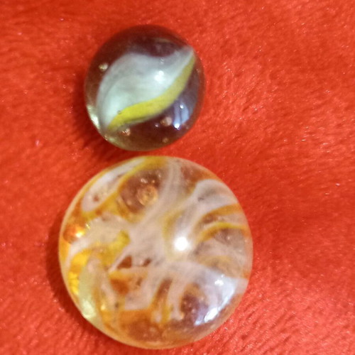 Vintage glass marbles used, set of 2, large one chipped