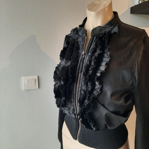 Black cardigan used, size small, V & M