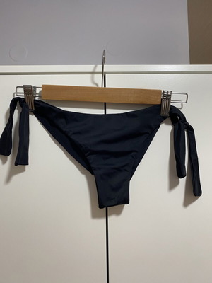 Black swimsuit with side ties size small like new lycra