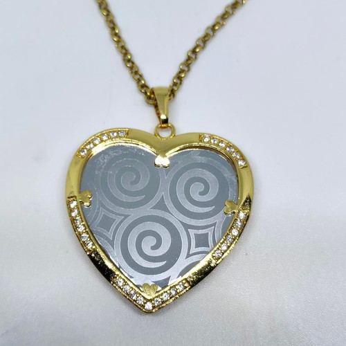 Heart Pendant Necklace with Embossed Spiral Designs, like new