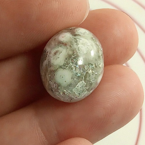 Agate semiprecious stone with crystal-filled cavity in egg shape new