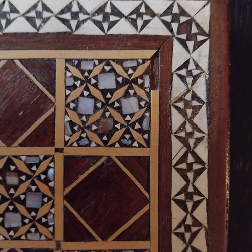 Handmade chess with mother-of-pearl and ancient Egyptian figures used