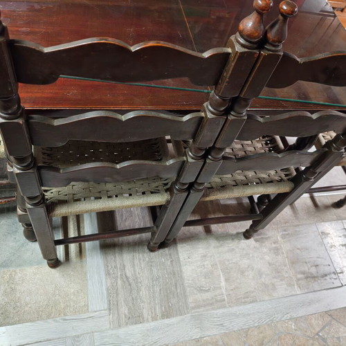 Wooden dining table with 4 chairs and glass top