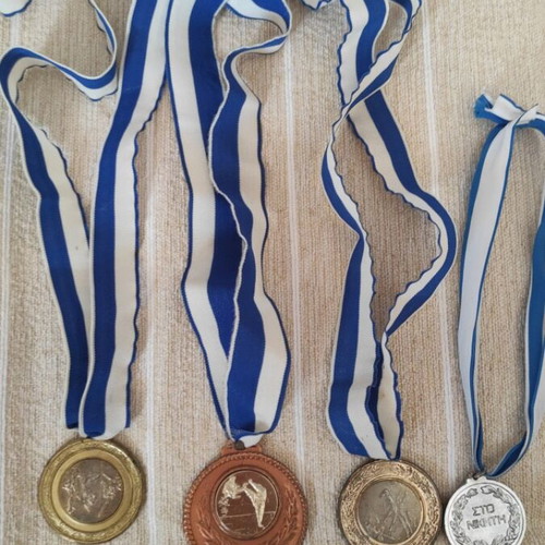 Pack of four sports medals
