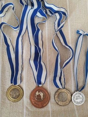 Pack of four sports medals