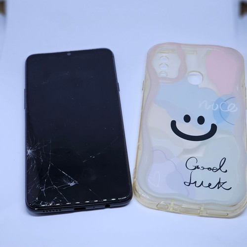 Samsung Galaxy M20 used for parts with case